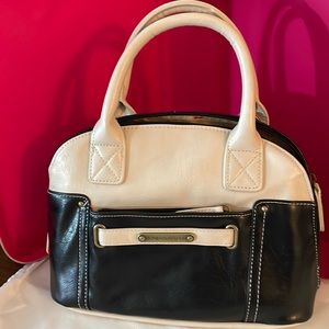 Handbag.  New condition. No damage or stains